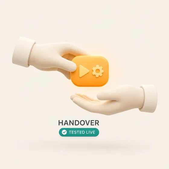 One hand passing an orange block to another, marked handover, tested live.