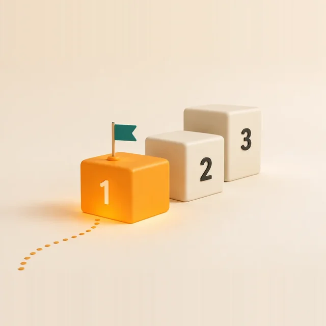 Three blocks in a row, the first one orange with a flag on it.